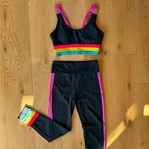 Lanston Sport two piece workout set with vibrant accents in size M.